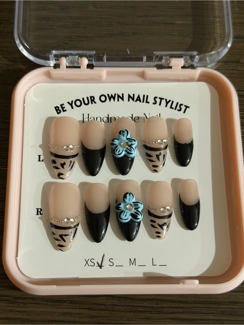 Handmade Nude & Black Press-On Nails with Blue Floral Accent